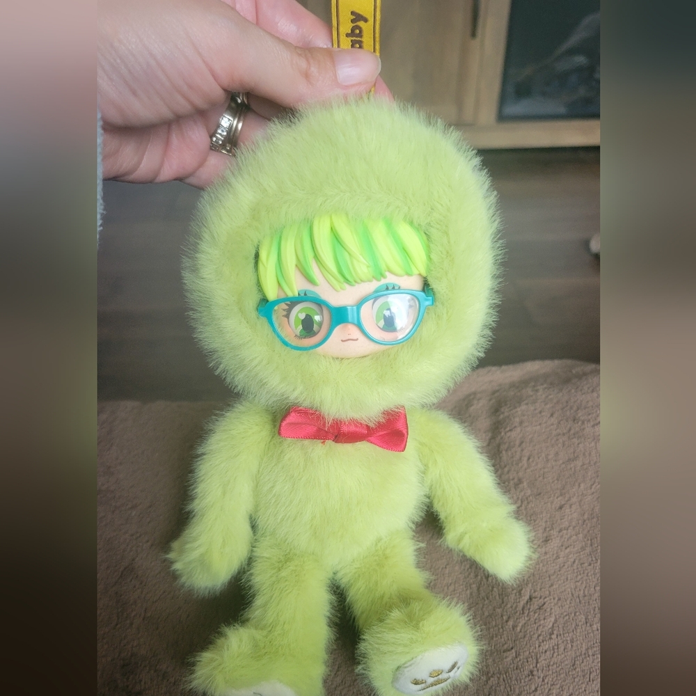 Green Furry Doll with Pink Bow